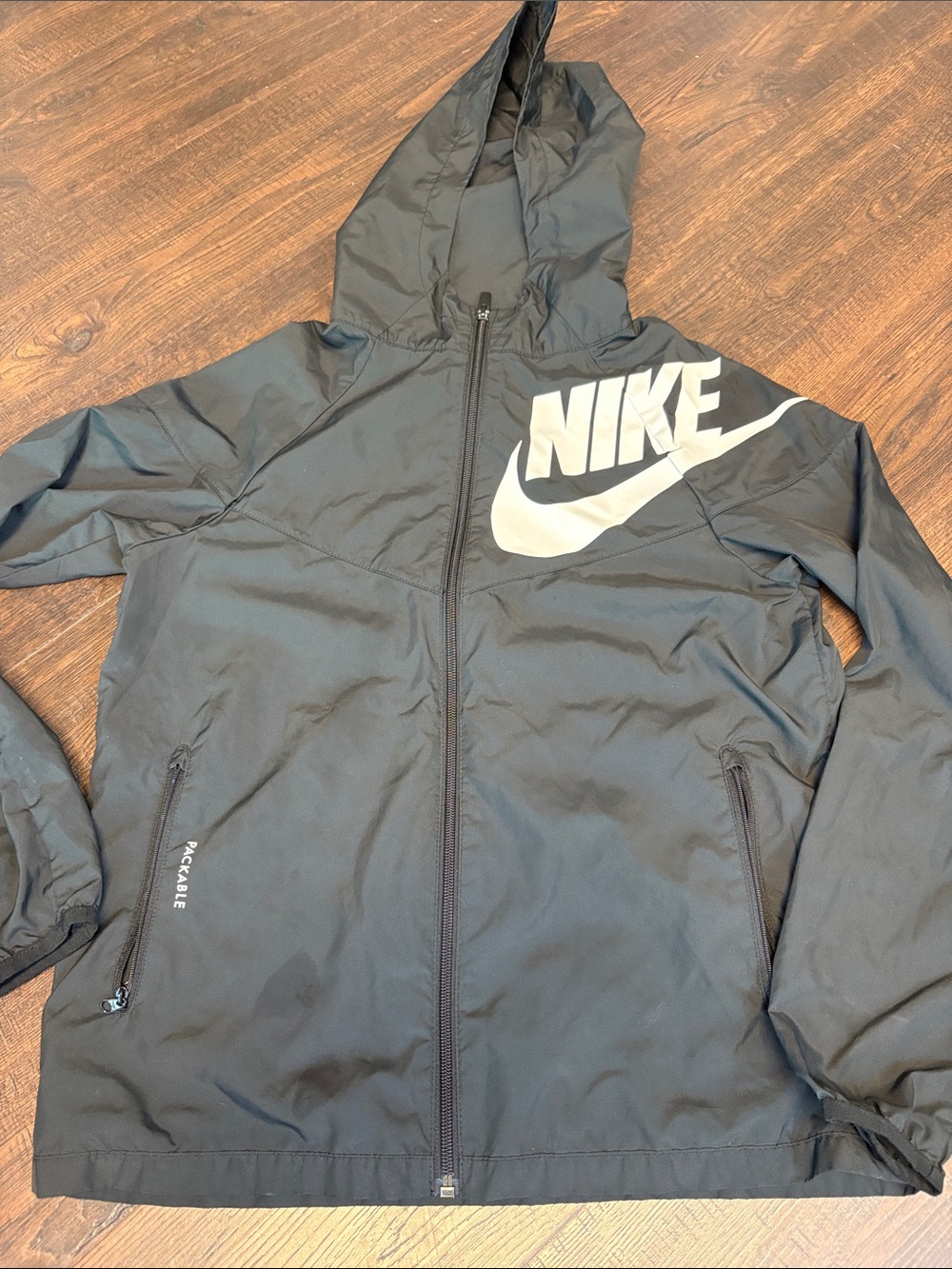 Nike Black Hooded Packable Travel Windbreaker with White Swoosh youth Large